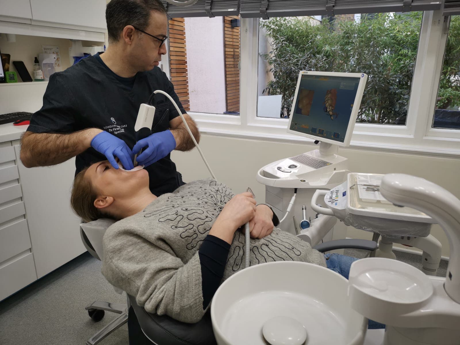 Dr Firas Daoudi carrying out digital dental scanning