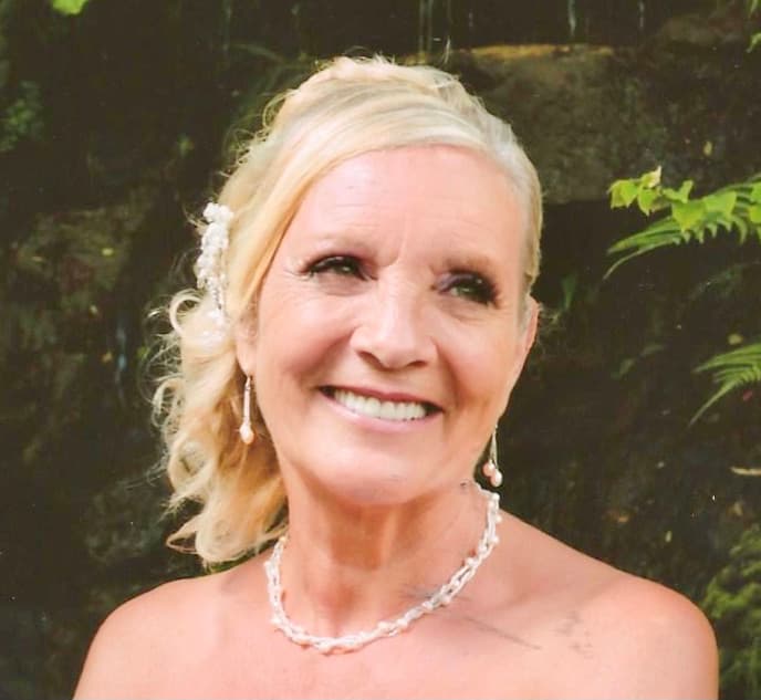 Smiling patient following conservative aesthetic dental treatment