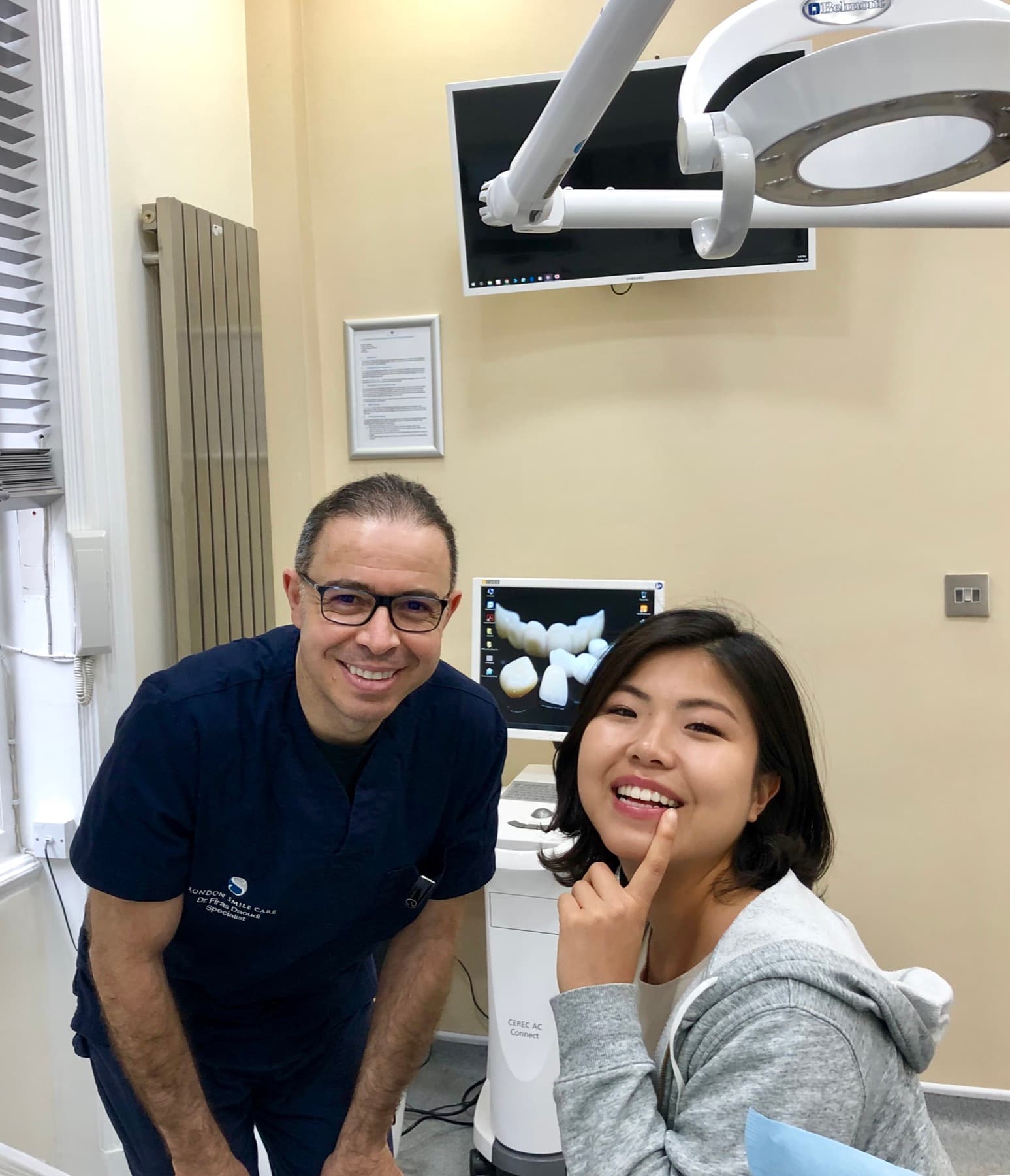 A patient with Dr Firas Daoudi after treatment