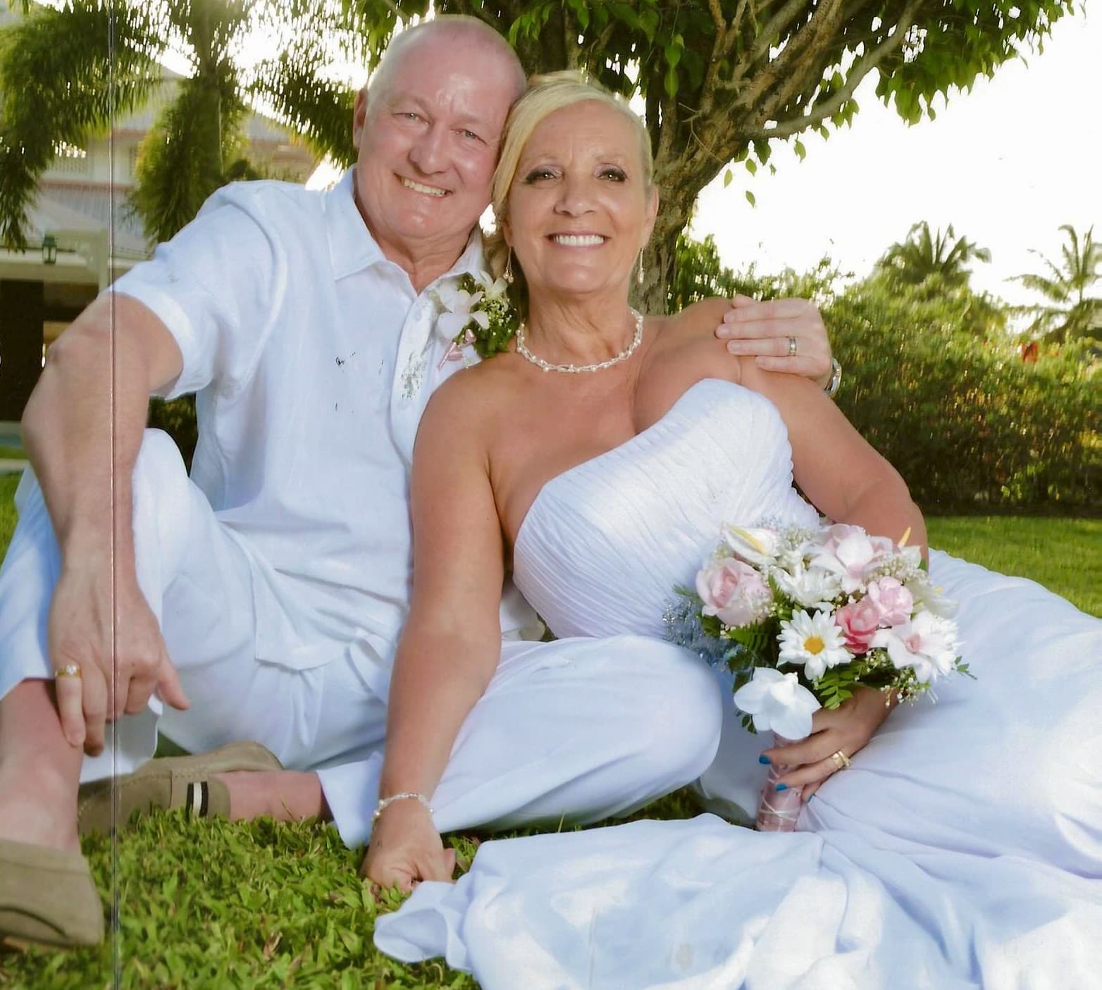 A smiling couple celebrating a special occasion showcasing a confident smile line